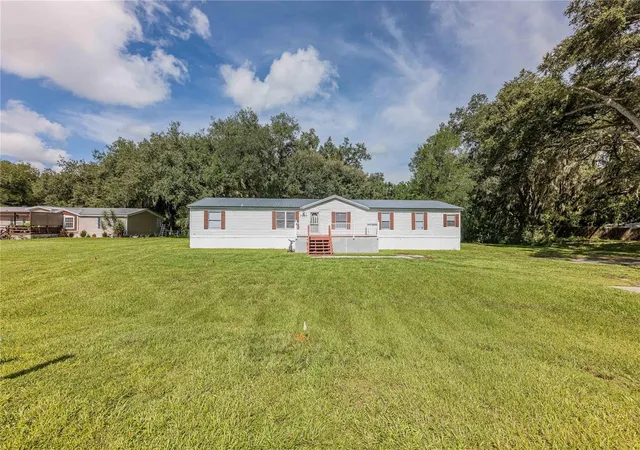 Photo 2 of Manufactured home for sale at 7309 Ryman Loop, Zephyrhills, FL 33540 | MLS# L4965011 | Listing updated on 2026-10-11