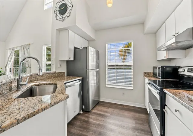 Listing Photo 1 - Condo for sale in building located at 9138 Lake Chase Island Wy, TAMPA, FL 33626