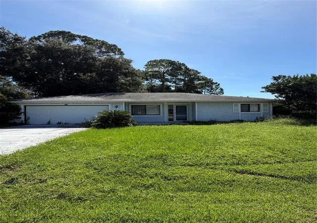 Photo 1 of Single family home for sale at 32 Bronson Ln, Palm Coast, FL 32137 | MLS# FC321409 | Listing updated on 2026-09-12