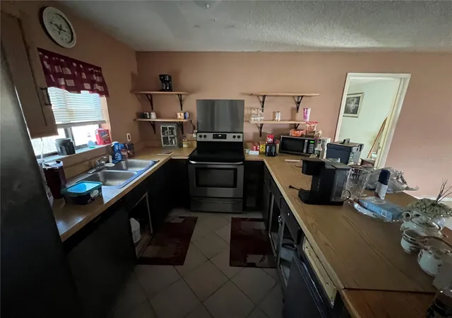 Photo 4 of Single family home for sale at 32 Bronson Ln, Palm Coast, FL 32137 | MLS# FC321409 | Listing updated on 2026-09-12