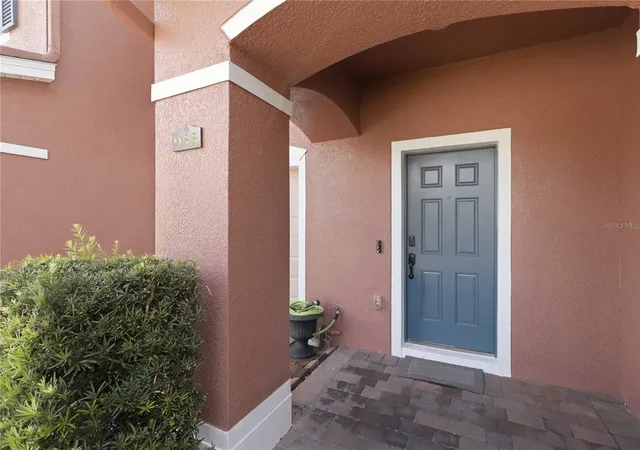 Photo 2 of Townhouse for sale at 933 Pine Pointe Ln, Orlando, FL 32828 | MLS# O6441240 | Listing updated on 2026-10-01