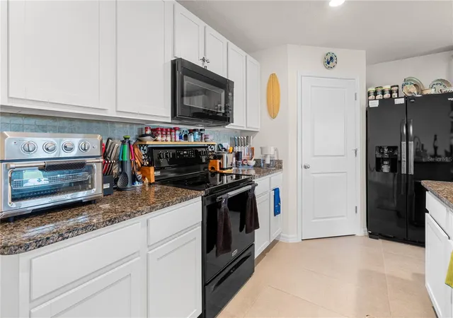 Photo 4 of Single family home for sale at 695 NW 243rd Terrace, Newberry, FL 32669 | MLS# GC543469 | Listing updated on 2026-09-16