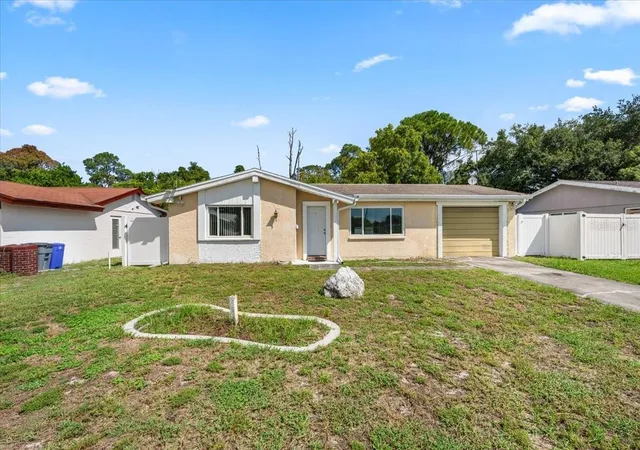 Photo 1 of Single family home for sale at 4041 Woodsville Dr, New Port Richey, FL 34652 | MLS# TB8548028 | Listing updated on 2026-09-13