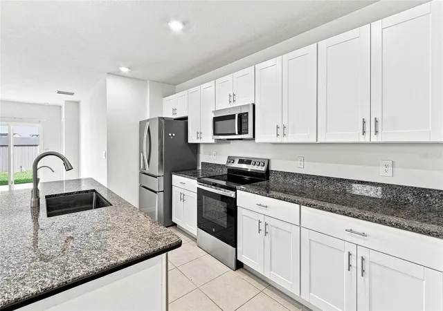 Photo 3 of Single family home for sale at 13659 Newbridge St, Spring Hill, FL 34609 | MLS# W7889472 | Listing updated on 2026-09-12