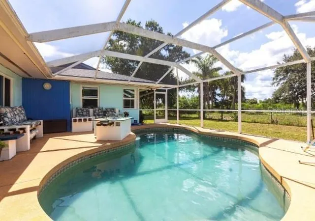 Photo 2 of Single family home for sale at 22348 Olean Blvd, Port Charlotte, FL 33952 | MLS# C7530677 | Listing updated on 2026-09-12