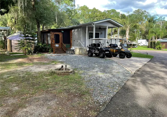Photo 2 of Manufactured home for sale at 25349 140th Place Ne, Fort Mc Coy, FL 32134 | MLS# OM732147 | Listing updated on 2026-09-26