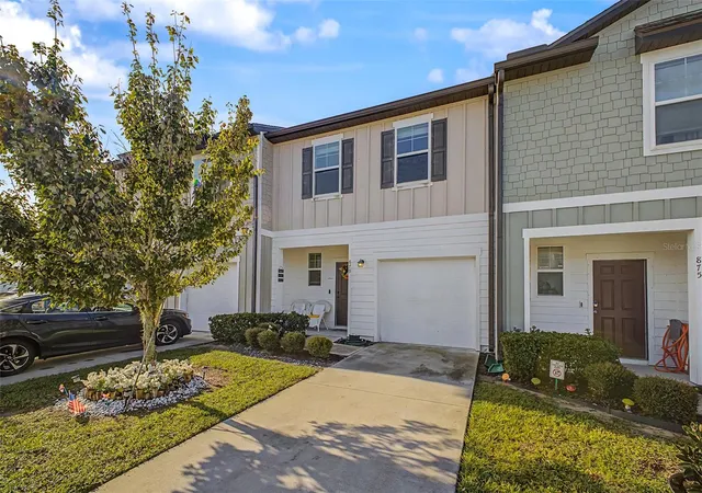 Photo 3 of Townhouse for sale at 879 Grandin St, Davenport, FL 33837 | MLS# S5157435 | Listing updated on 2026-10-03