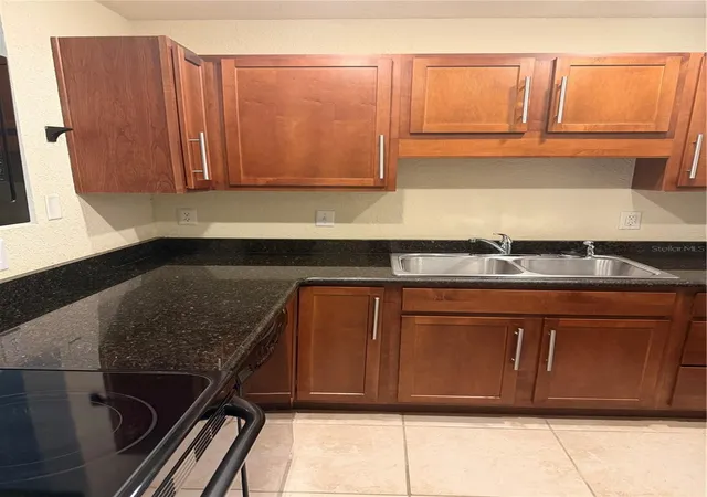 Photo 2 of Condo for sale at 1928 Conway Rd #14, Orlando, FL 32812 | MLS# O6441321 | Listing updated on 2026-09-28