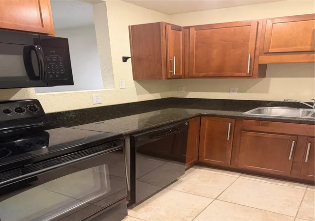 Photo 3 of Condo for sale at 1928 Conway Rd #14, Orlando, FL 32812 | MLS# O6441321 | Listing updated on 2026-09-28