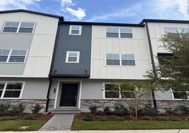 Photo 1 of Townhouse for sale at 9148 Sinatra Ln, Orlando, FL 32827 | MLS# O6441347 | Listing updated on 2026-09-13