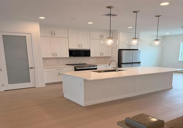 Photo 2 of Townhouse for sale at 9148 Sinatra Ln, Orlando, FL 32827 | MLS# O6441347 | Listing updated on 2026-09-13