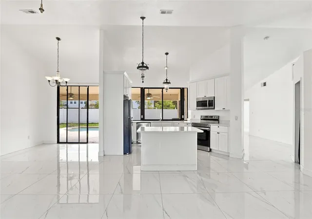 Photo 4 of Single family home for sale at 247 Competition Dr, Kissimmee, FL 34743 | MLS# O6441348 | Listing updated on 2026-09-18