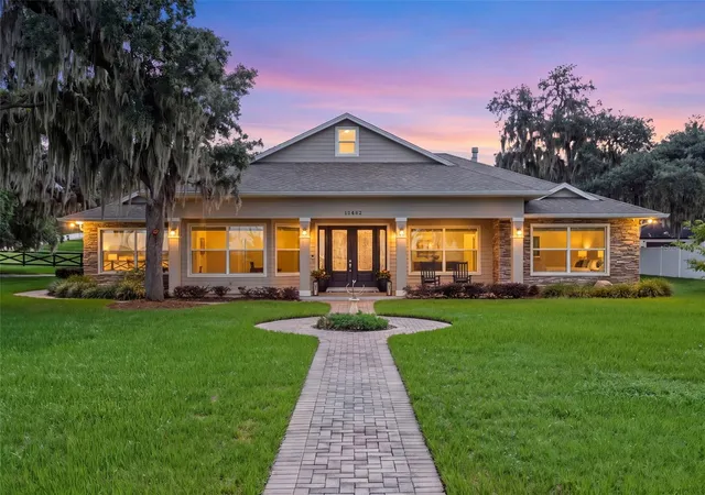 Photo 1 of Single family home for sale at 12442 Lakeshore Dr, Clermont, FL 34711 | MLS# O6441365 | Listing updated on 2026-10-13