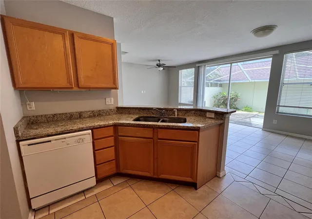 Photo 1 of Townhouse for sale at 10008 Tate Ln, Tampa, FL 33626 | MLS# TB8548144 | Listing updated on 2026-09-19
