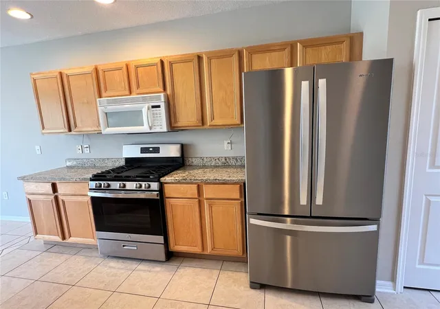 Photo 2 of Townhouse for sale at 10008 Tate Ln, Tampa, FL 33626 | MLS# TB8548144 | Listing updated on 2026-09-19