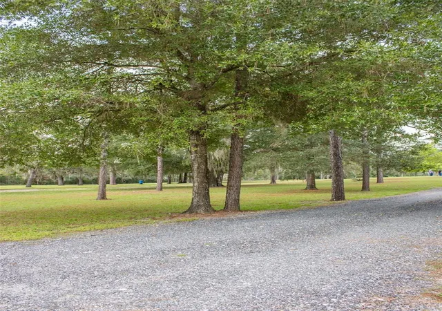Photo 3 of Manufactured home for sale at 11830 NE 106th Court, Archer, FL 32618 | MLS# GC543480 | Listing updated on 2026-09-28
