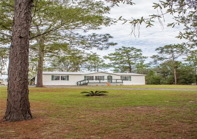 Photo 4 of Manufactured home for sale at 11830 NE 106th Court, Archer, FL 32618 | MLS# GC543480 | Listing updated on 2026-09-28