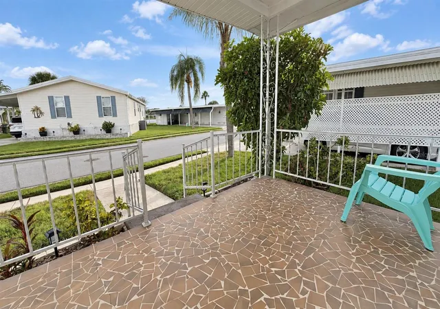 Photo 2 of Manufactured home for sale at 1100 Belcher Rd S #64, Largo, FL 33771 | MLS# TB8548216 | Listing updated on 2026-09-14