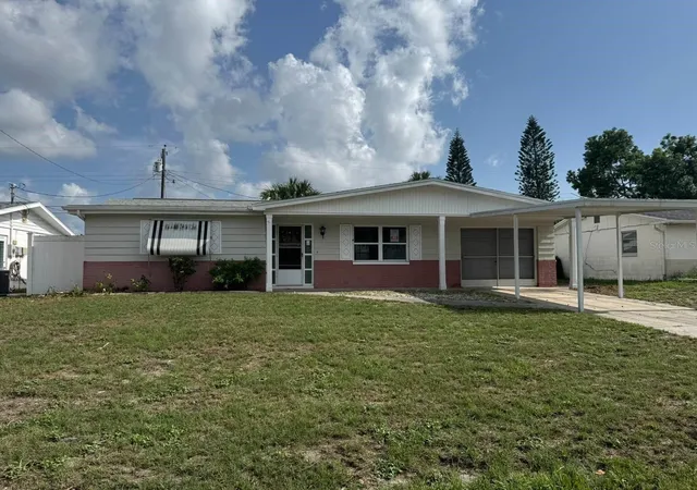 Photo 1 of Single family home for sale at 4640 Tropical Ln, Holiday, FL 34690 | MLS# TB8548238 | Listing updated on 2026-09-14