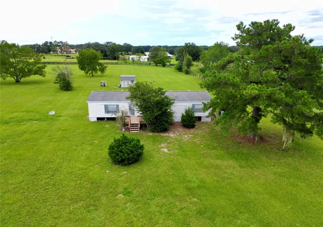 Photo 2 of Manufactured home for sale at 1401 Sw 145th Street, Ocala, FL 34473 | MLS# OM732183 | Listing updated on 2026-09-17