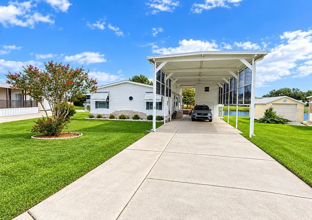 Photo 1 of Manufactured home for sale at 4986 Mount Olive Shrs Dr, Polk City, FL 33868 | MLS# P4939882 | Listing updated on 2026-10-09