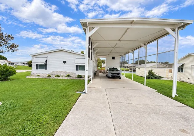 Photo 2 of Manufactured home for sale at 4986 Mount Olive Shrs Dr, Polk City, FL 33868 | MLS# P4939882 | Listing updated on 2026-10-09