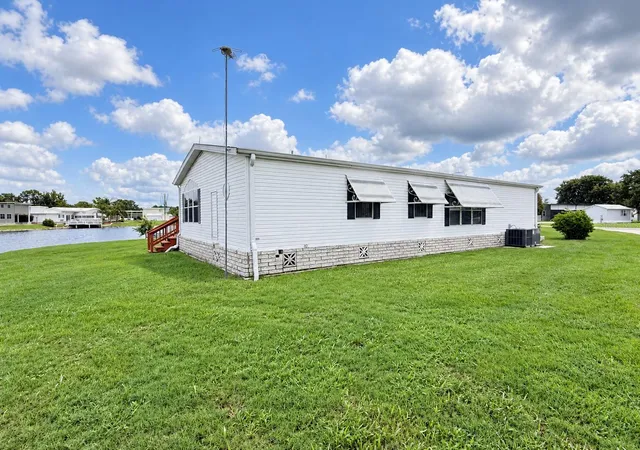 Photo 3 of Manufactured home for sale at 4986 Mount Olive Shrs Dr, Polk City, FL 33868 | MLS# P4939882 | Listing updated on 2026-10-09