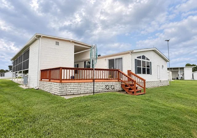 Photo 4 of Manufactured home for sale at 4986 Mount Olive Shrs Dr, Polk City, FL 33868 | MLS# P4939882 | Listing updated on 2026-10-09
