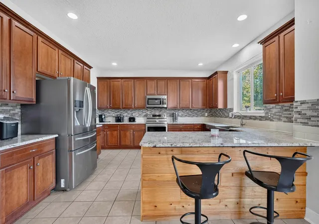 Photo 1 of Single family home for sale at 77 Rollins Ln, Palm Coast, FL 32164 | MLS# O6441484 | Listing updated on 2026-10-04