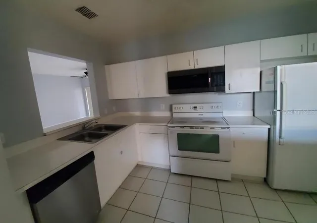 Photo 3 of Condo for sale at 13215 Villa Vista Dr #203, Orlando, FL 32824 | MLS# O6441492 | Listing updated on 2026-10-01
