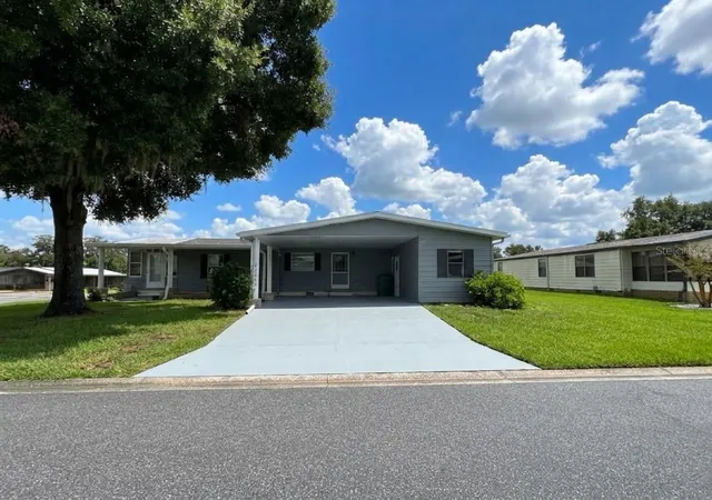 Photo 3 of Manufactured home for sale at 2353 W Coach N Four Dr, Leesburg, FL 34748 | MLS# O6441506 | Listing updated on 2026-09-16