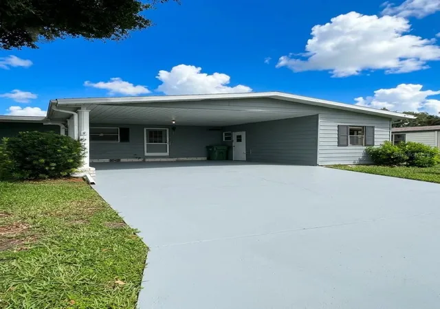Photo 3 of Manufactured home for sale at 2353 W Coach N Four Dr, Leesburg, FL 34748 | MLS# O6441506 | Listing updated on 2026-09-16