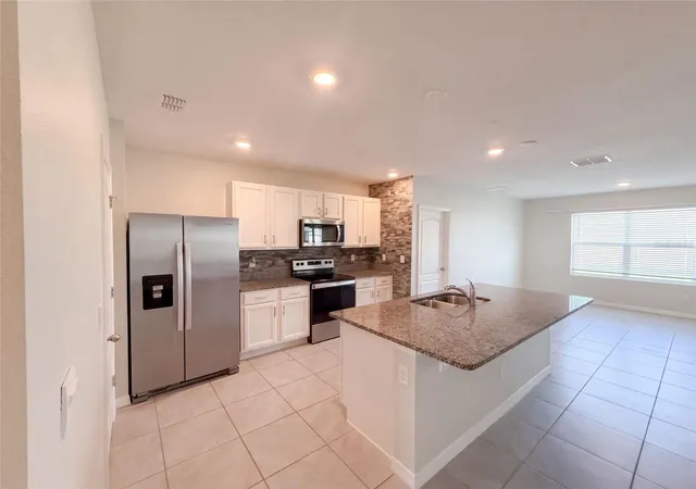Photo 2 of Single family home for sale at 2112 Elio Ridge Dr, Zellwood, FL 32798 | MLS# O6441507 | Listing updated on 2026-10-08