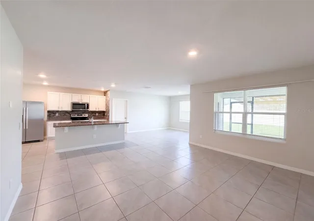 Photo 3 of Single family home for sale at 2112 Elio Ridge Dr, Zellwood, FL 32798 | MLS# O6441507 | Listing updated on 2026-10-08