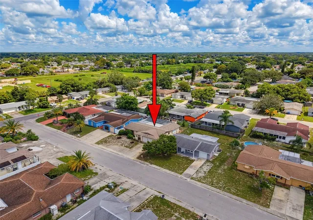 Photo 4 of Single family home for sale at 9916 Lake Chrise Ln, Port Richey, FL 34668 | MLS# W7889495 | Listing updated on 2026-09-30
