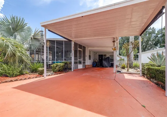Photo 1 of Manufactured home for sale at 8 Woodland Cir, Haines City, FL 33844 | MLS# L4965045 | Listing updated on 2026-09-22