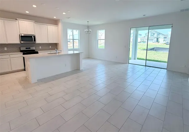 Photo 2 of Single family home for sale at 6736 Spotted Eagle Loop, Howey In The Hills, FL 34737 | MLS# O6441629 | Listing updated on 2026-10-04