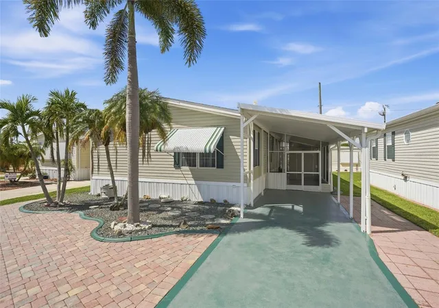 Manufactured home for sale at 10100 Burnt Store Rd #122, PUNTA GORDA, FL 33950 | MLS# C7530716