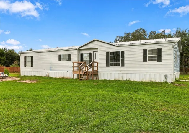 Photo 1 of Manufactured home for sale at 19046 Nw 302nd Street, Okeechobee, FL 34972 | MLS# K4903788 | Listing updated on 2026-09-25