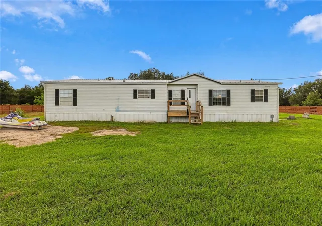 Photo 3 of Manufactured home for sale at 19046 Nw 302nd Street, Okeechobee, FL 34972 | MLS# K4903788 | Listing updated on 2026-09-25
