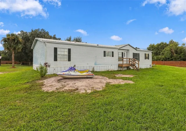 Photo 3 of Manufactured home for sale at 19046 NW 302nd Street, Okeechobee, FL 34972 | MLS# K4903788 | Listing updated on 2026-09-25