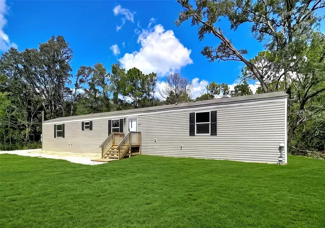 Photo 2 of Manufactured home for sale at 549 W Kuhns Ln, Lecanto, FL 34461 | MLS# OM732252 | Listing updated on 2026-09-19