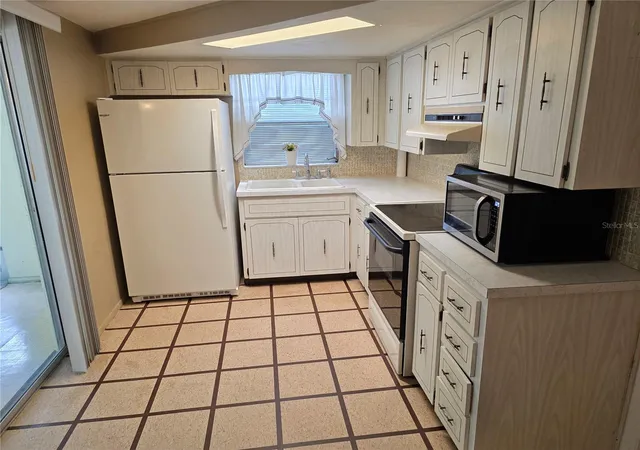 Photo 4 of Single family home for sale at 9920 Richwood Ln, Port Richey, FL 34668 | MLS# W7889517 | Listing updated on 2026-09-30