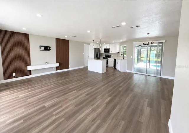 Photo 3 of Single family home for sale at 1359 Tyler Ave, Spring Hill, FL 34606 | MLS# TB8548616 | Listing updated on 2026-10-05