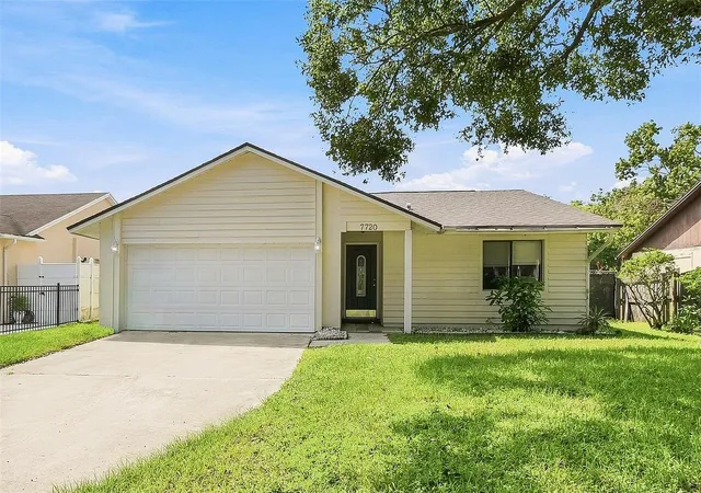 Photo 1 of Single family home for sale at 7720 Lakeside Woods Dr, Orlando, FL 32810 | MLS# O6441808 | Listing updated on 2026-09-17