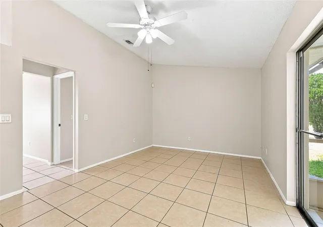 Photo 2 of Single family home for sale at 7720 Lakeside Woods Dr, Orlando, FL 32810 | MLS# O6441808 | Listing updated on 2026-09-17