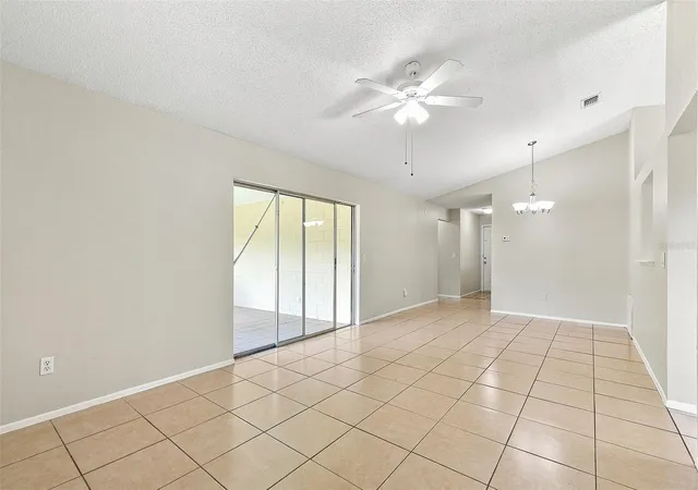Photo 3 of Single family home for sale at 7720 Lakeside Woods Dr, Orlando, FL 32810 | MLS# O6441808 | Listing updated on 2026-09-17