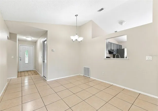 Photo 4 of Single family home for sale at 7720 Lakeside Woods Dr, Orlando, FL 32810 | MLS# O6441808 | Listing updated on 2026-09-17