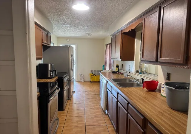 Photo 3 of Single family home for sale at 6439 Undine Way, Orlando, FL 32818 | MLS# O6441820 | Listing updated on 2026-10-02