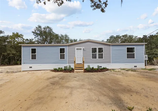 Photo 1 of Manufactured home for sale at 12371 Ne 82nd Place, Bronson, FL 32621 | MLS# GC543520 | Listing updated on 2026-09-18